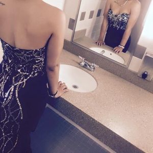 Strapless, black, sequenced front and on back.